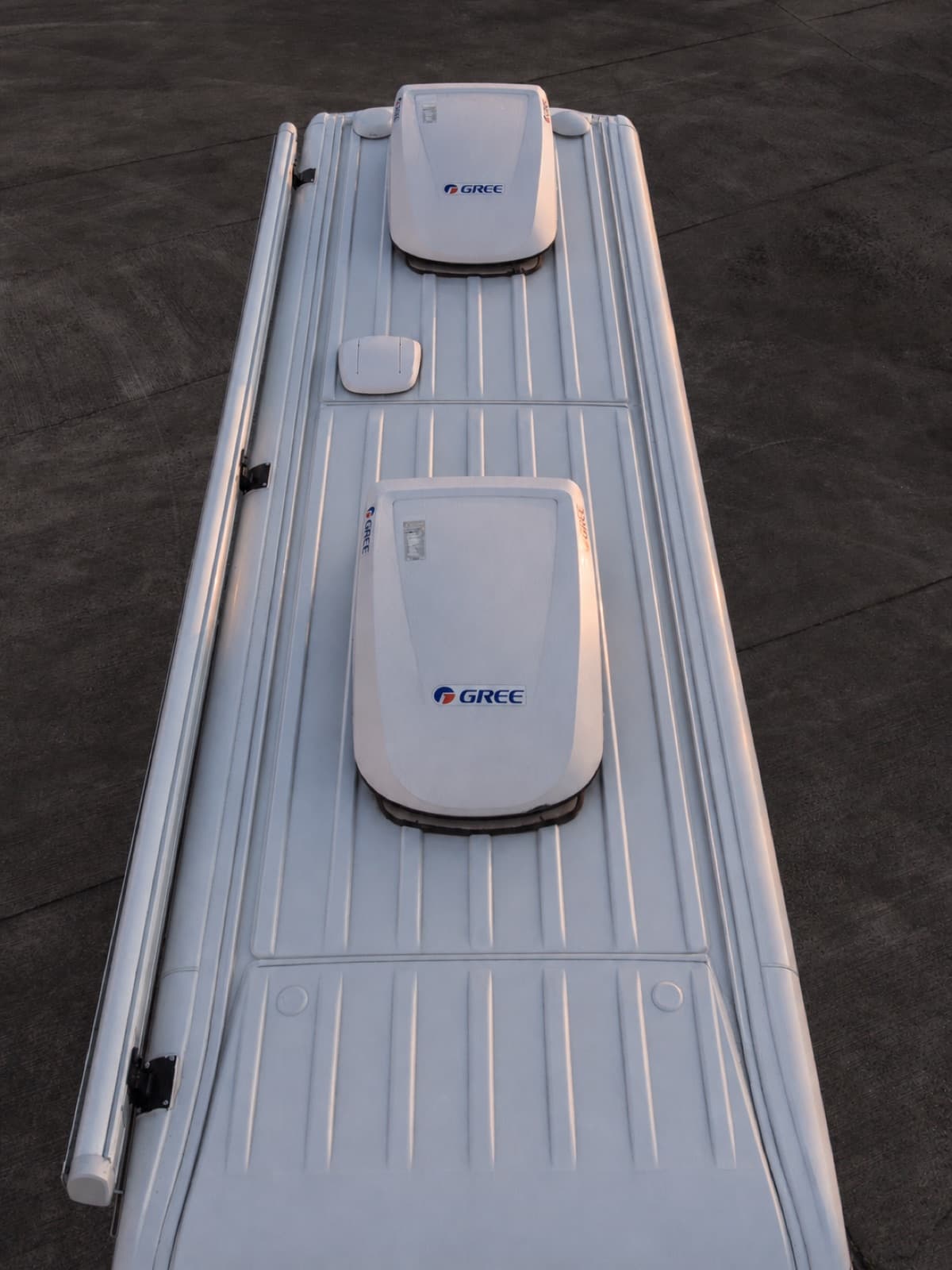 Dual rooftop air conditioning units on the roof of OB-1